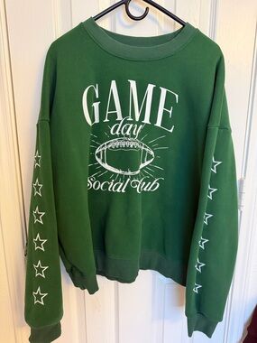 Kirklands Green Crewneck Sweatshirt with White Football Graphic